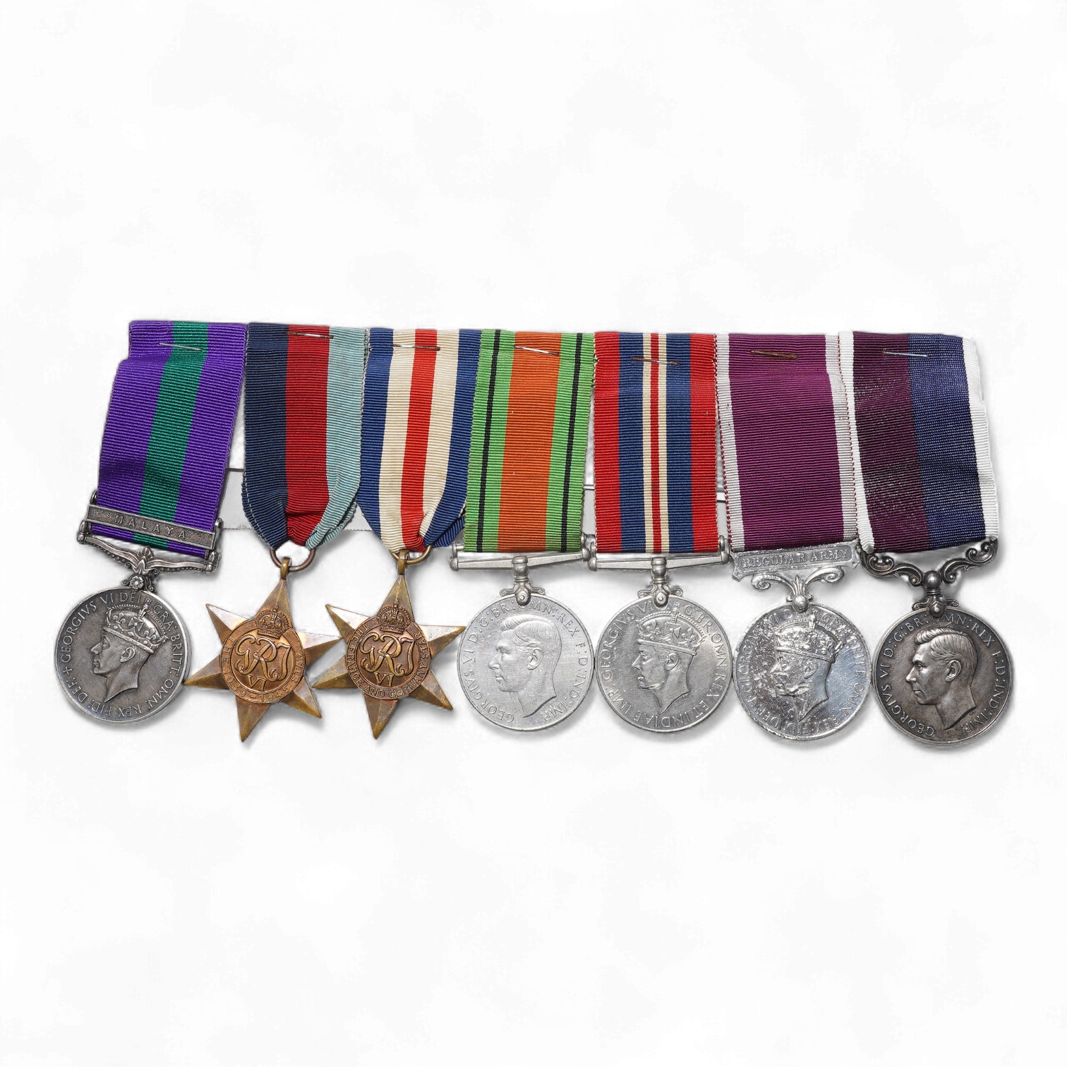 A WWII medal group awarded to Sqdn. Ldr. J.M. Anderson. R.A.F., also engraved under the ranks of Private (7260344), and Flight Officer, comprising of seven medals (three engraved)